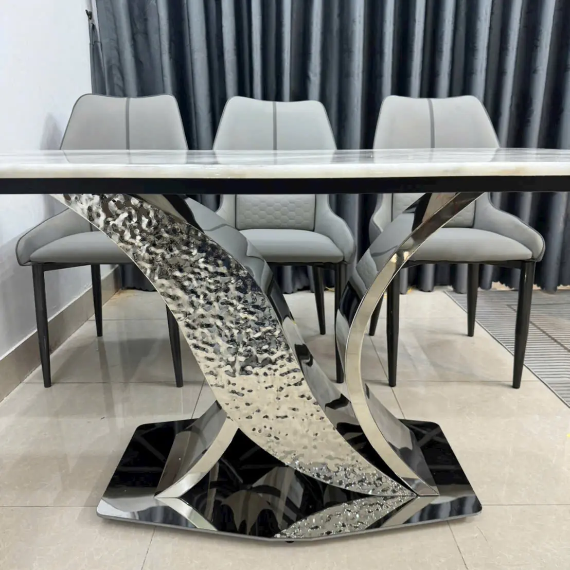 Bộ bàn ăn 6 ghế mặt đá chân inox cách điệu hiện đại - SP15525 8 bo ban an 6 ghe mat da chan inox cach dieu hien dai sp15525